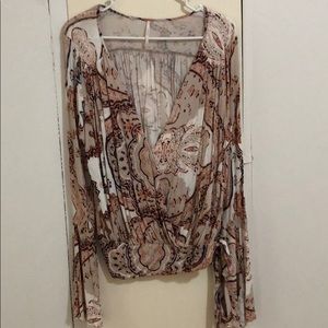 Free People multi colored wrap top with bellsleeve